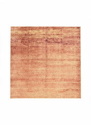 7' x 7' square terracotta copper textured modern area rug featuring a subtle abstract pattern with soft beige undertones.
