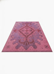 7' x 9' Pink Soft Purple Ornamental Washable Area Rug displayed alone in a full flat lay view highlighting its ornate central medallion design in pink and soft purple tones.