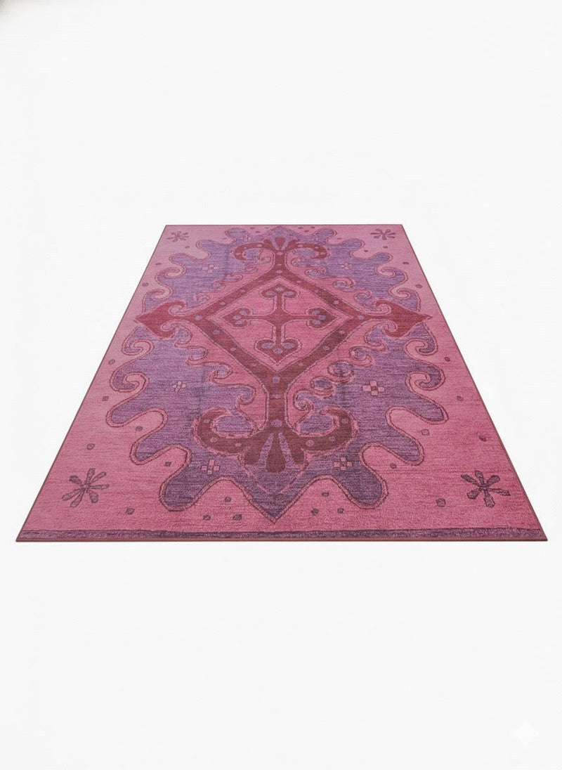 7' x 9' Pink Soft Purple Ornamental Washable Area Rug displayed alone in a full flat lay view highlighting its ornate central medallion design in pink and soft purple tones.