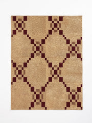 7' x 9' Rectangular Beige & Burgundy Diamond Geometric Modern Area Rug featuring a repeating diamond lattice pattern with burgundy square accents on a textured beige background, displayed in product view.