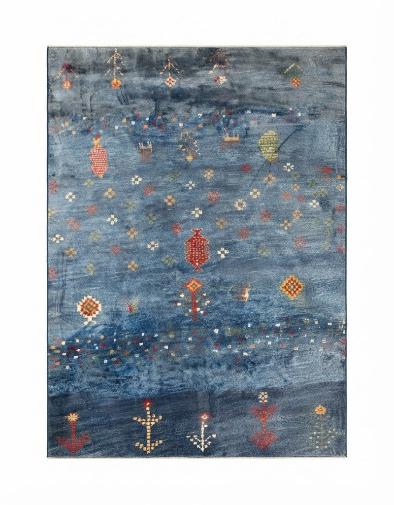 7' x 9' Rectangular Blue Multicolor Tribal Geometric Southwestern Area Rug featuring colorful scattered floral and geometric motifs on a distressed blue background, displayed in product view.
