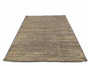 7' x 9' Rectangular Brown Beige Textured Jute-Style Farmhouse Washable Area Rug displayed on a white background, showing its natural woven texture and rectangular shape.
