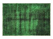 7' x 9' Rectangular Emerald Green & Black Distressed Abstract Modern Washable Area Rug featuring a textured emerald green background with dark black distressed patterns.