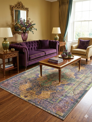 7' x 9' Rectangular Purple & Multicolor Medallion Distressed Traditional Area Rug styled in an elegant living room with sofa, armchair, and coffee table.