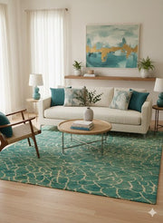 7' x 9' Rectangular Teal Beige Crackled Geometric Abstract Modern Area Rug styled in a living room with a beige sofa and round wooden coffee table.