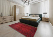 7' x 9' Traditional Red Burgundy Persian Area Rug styled in a contemporary bedroom setting, emphasizing the deep red color palette and detailed traditional pattern.