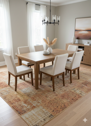 7'x 9' Warm Tan Cream & Rust Distressed Vintage Rectangular Washable Area Rug placed in a formal dining room.