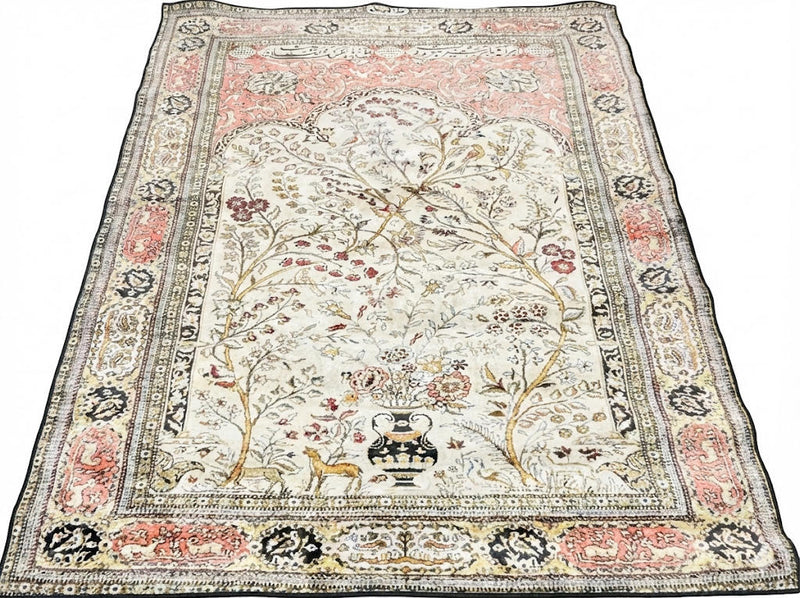 7' x 9' ivory multi-color traditional area rug featuring a detailed floral tree botanical pattern with decorative borders.