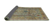 8' Round Dark Khaki Green Traditional Persian Area Rug angled product view displaying the full design and backing detail.
