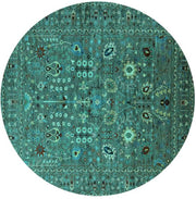8' Round Turquoise Oriental Industrial Area Rug product view highlighting the circular shape and intricate vintage-inspired motifs.