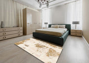 8' Square Ivory Gold Distressed Modern Abstract Area Rug styled in a bedroom setting, demonstrating how the neutral palette complements modern interiors.