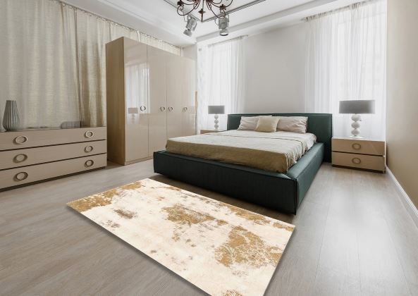 8' Square Ivory Gold Distressed Modern Abstract Area Rug styled in a bedroom setting, demonstrating how the neutral palette complements modern interiors.