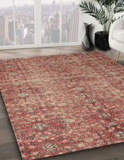 8' Square Light Copper Gold Traditional Persian Rug angled close-up displaying the intricate traditional detailing and softly distressed texture.