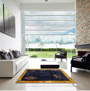 8' Square Navy & Gold Traditional Oriental Rug styled in a bright contemporary living room, highlighting the deep navy field and decorative gold border with delicate floral accents.