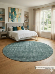 8 ft Round Teal & Light Gray Distressed Abstract Modern Contemporary Washable Area Rug styled in a bright modern bedroom.