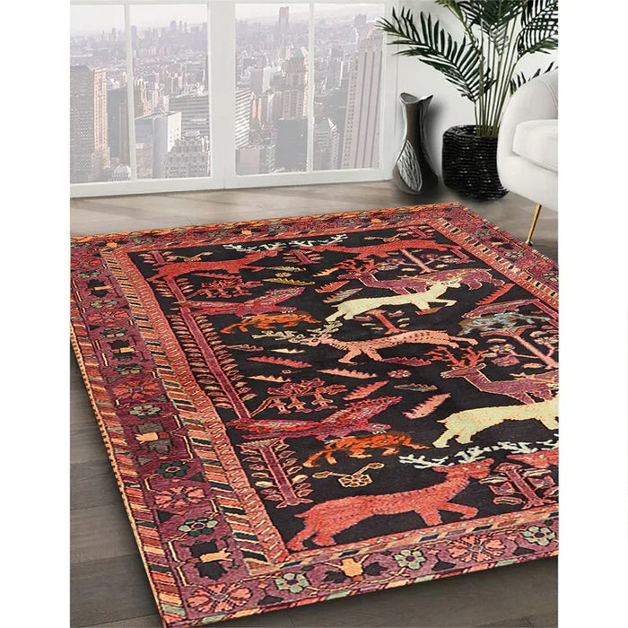 8 ft Square Rust Pink & Black Animal Motif Traditional Area Rug styled in a modern living room with large windows and indoor plant.