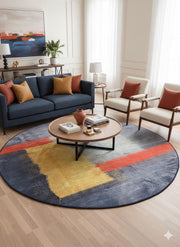 8' round navy blue modern abstract rug placed under a round coffee table in a bright living room with a navy sofa and neutral armchairs.