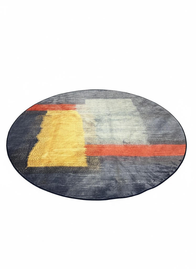 8' round navy blue multi-color area rug featuring a modern abstract color block design with mustard yellow, burnt orange, and gray accents.