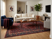 8' x 10' Burgundy Navy Geometric Medallion Traditional Washable Area Rug styled in a living room with a cream sofa, navy accent chair, and wooden coffee table.