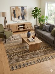 8' x 10' Rectangular Beige & Blue Tribal Geometric Washable Area Rug placed in a modern living room with wooden coffee table and sofa.