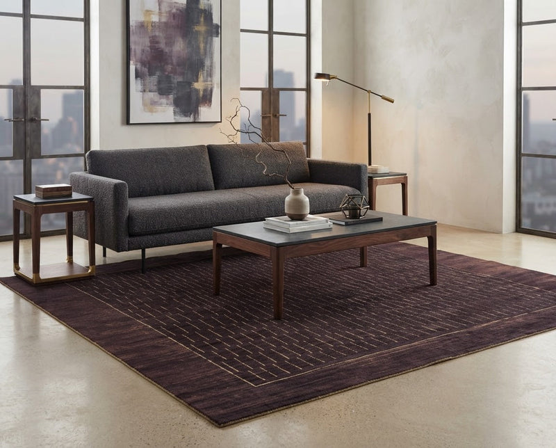 8' x 10' Rectangular Dark Brown Beige Linear Geometric Modern Washable Area Rug styled in a living room with a charcoal gray sofa and wooden coffee table.