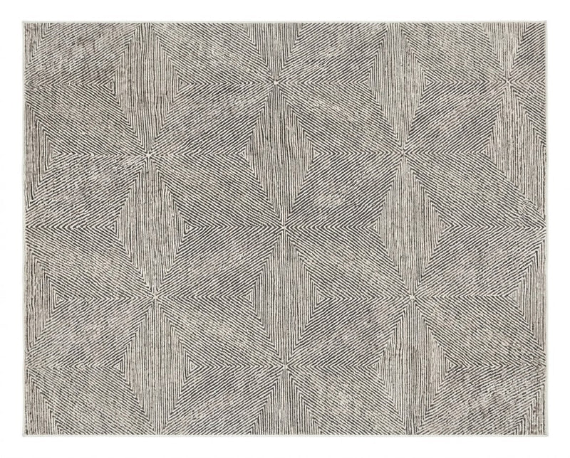 8' x 10' Rectangular Ivory & Charcoal Gray Geometric Starburst Modern Washable Area Rug featuring repeating angular starburst patterns with fine linear detailing, displayed in product view.