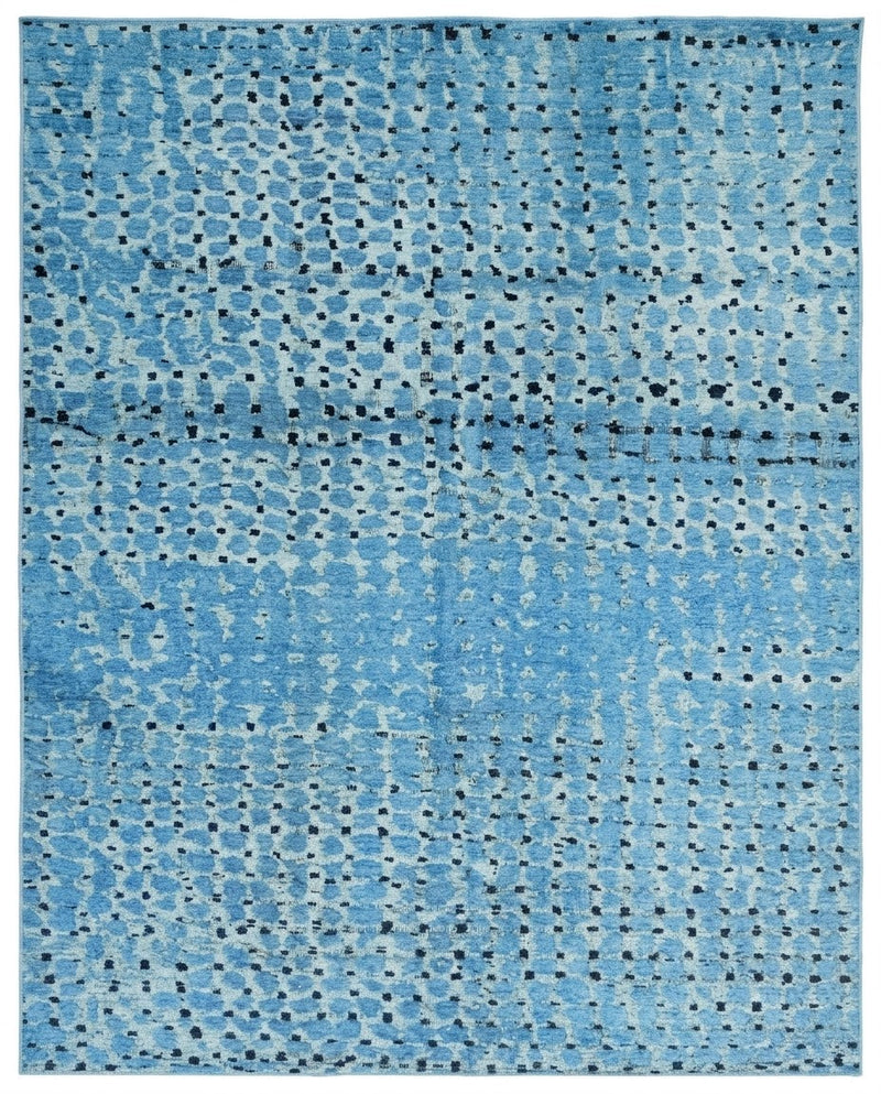 8' x 10' Rectangular Light Blue & Navy Blue Spotted Abstract Modern Washable Area Rug featuring scattered dark dots and a textured blue background, displayed in product view.