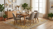 8' x 10' Rectangular Mustard Gold Ivory Geometric Medallion Traditional Washable Area Rug styled in a dining room with a wooden table and gray upholstered chairs.