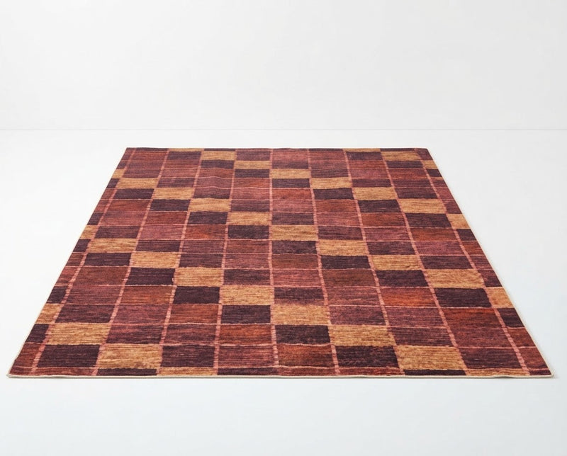 8' x 10' Rectangular Rust Brown & Mustard Gold Checkered Geometric Modern Washable Area Rug featuring alternating textured squares, displayed in product view.