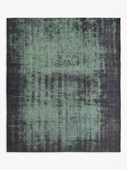 8' x 10' Rectangular Sage Green & Charcoal Gray Distressed Abstract Modern Washable Area Rug featuring a faded textured design with dark charcoal accents, displayed in product view.