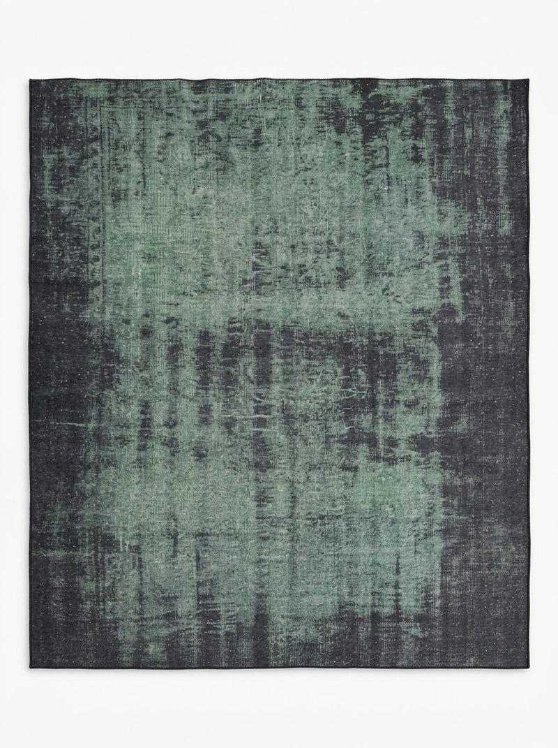 8' x 10' Rectangular Sage Green & Charcoal Gray Distressed Abstract Modern Washable Area Rug featuring a faded textured design with dark charcoal accents, displayed in product view.