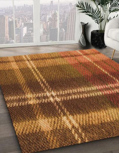 8' x 10' Tomato Red Brown Gold Patterned Rug close-up perspective view highlighting the textured plaid-inspired pattern in warm red, brown, and gold tones.
