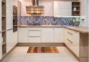 8' x 10' Tomato Red Brown Gold Patterned Rug displayed in a contemporary kitchen space, emphasizing the versatile pattern and rich blended tones.