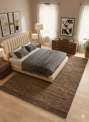 8' x 12' Rectangular Dark Brown & Gold Striped Textured Modern Washable Area Rug placed beneath a cream upholstered bed with gray bedding and wooden nightstands.
