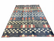 8' x 12' Rectangular Navy Blue & Red Stars and Stripes Patriotic Americana Area Rug featuring ivory stars and red geometric accents displayed on a white background.