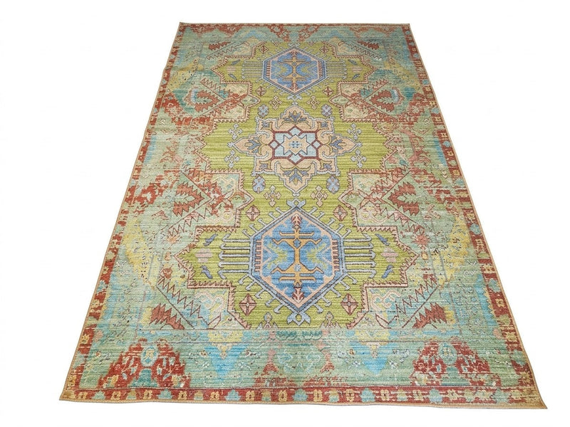 8' x 12' Rectangular Sage Green & Blue Distressed Geometric Medallion Southwestern Washable Area Rug displayed on a white background.