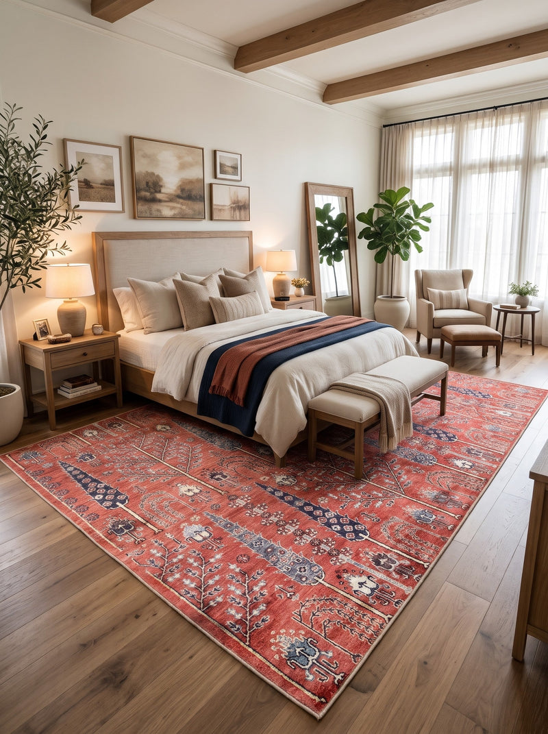 8' x 12' Rectangular Terracotta Red & Navy Blue Tree of Life Botanical Traditional Area Rug placed beneath a wooden bed with cream bedding and an upholstered bench.