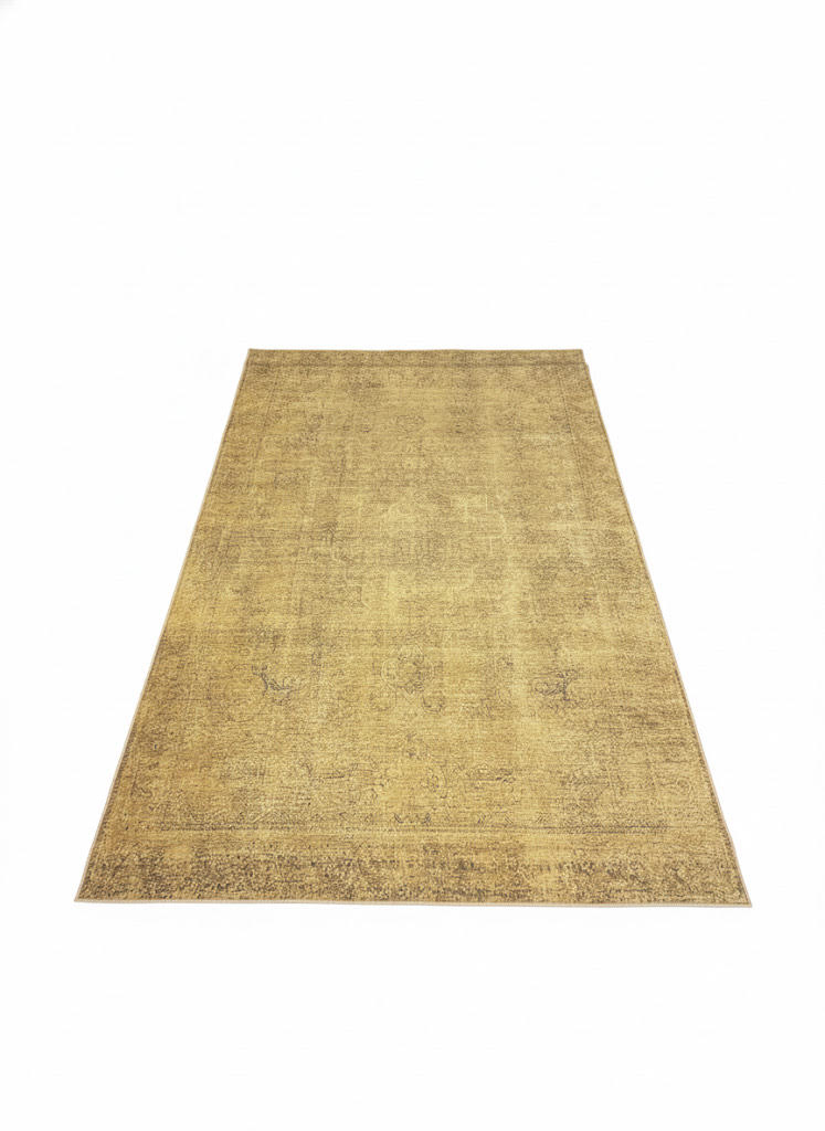 8' x 12' golden tan distressed traditional area rug featuring subtle brown detailing and a washable non-slip backing.