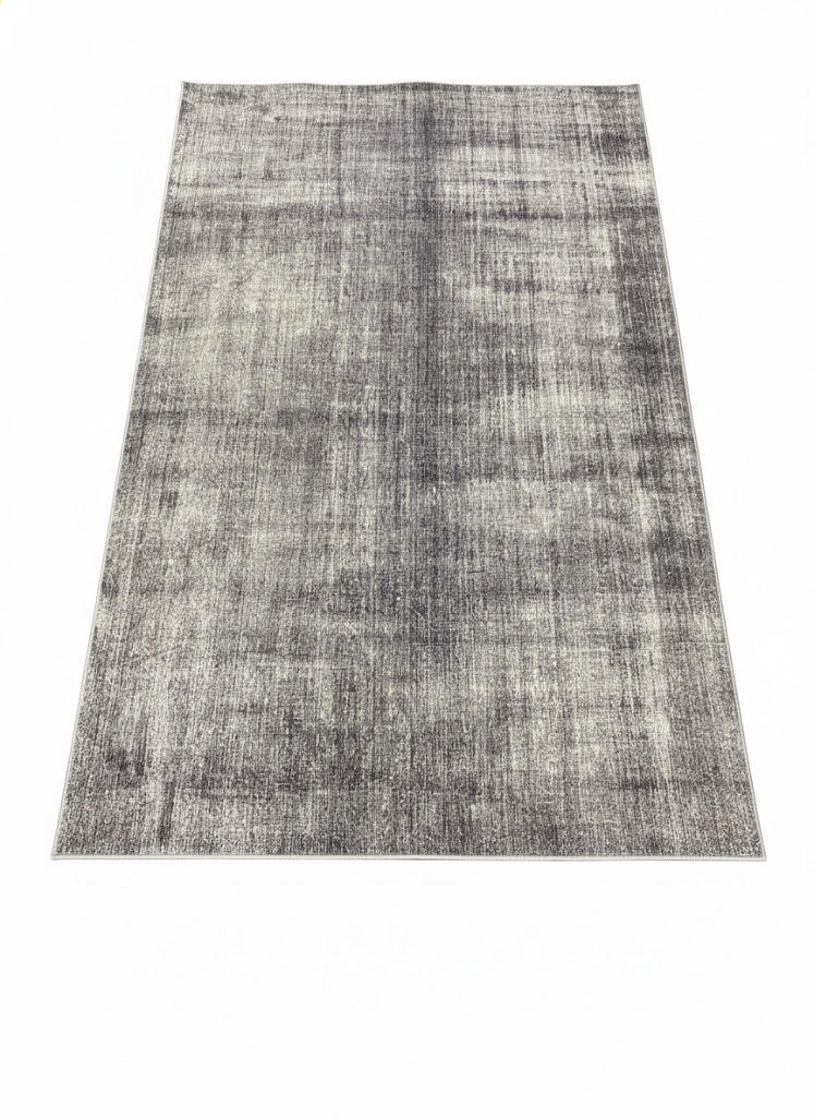 8' x 12' gray and ivory distressed abstract area rug featuring soft tonal variation with light silver and charcoal accents for a modern textured look.
