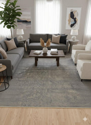 8' x 12' gray soft beige distressed washable area rug styled in a neutral living room with modern sofas, accent chairs, and a wooden coffee table.