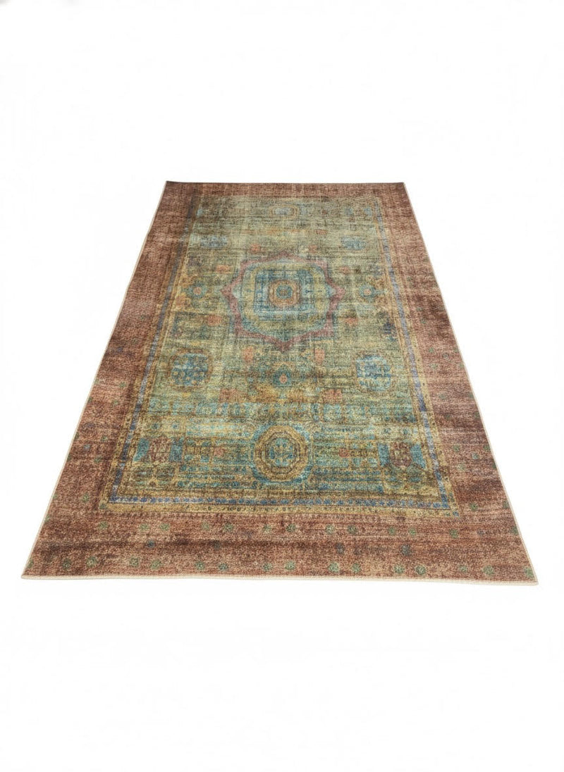 8' x 12' rectangular traditional area rug featuring a distressed medallion pattern with brown, teal, blue, and beige tones.