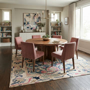 8' x 8' Square Blue Pink & Ivory Floral Medallion Bohemian Area Rug styled in a dining room beneath a round wooden dining table and pink upholstered chairs.