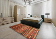 8' x 8' Square Bronze Brown Red Contemporary Oriental Area Rug styled in a contemporary bedroom setting, demonstrating how the colorful striped design complements modern interiors.
