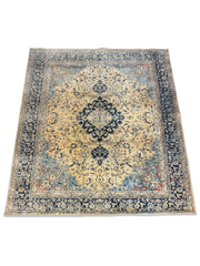 8' x 8' Square Ivory & Navy Blue Floral Medallion Traditional Area Rug isolated on a white background.