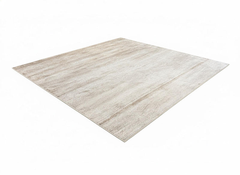 8' x 8' square beige and ivory textured minimalist area rug featuring subtle tonal variation and a clean modern design.