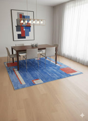 8' x 8' square blue geometric contemporary area rug placed beneath a modern dining table with light upholstered chairs and abstract wall art.