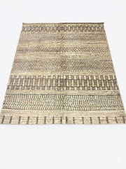 8' x 8' square washable area rug featuring a distressed geometric stripe pattern in beige and brown tones with a non-slip backing.