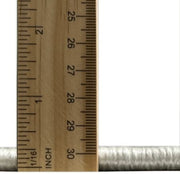 Close-up measurement image showing the 2' x 3' ivory and gold distressed abstract accent rug low-profile pile thickness using a ruler.