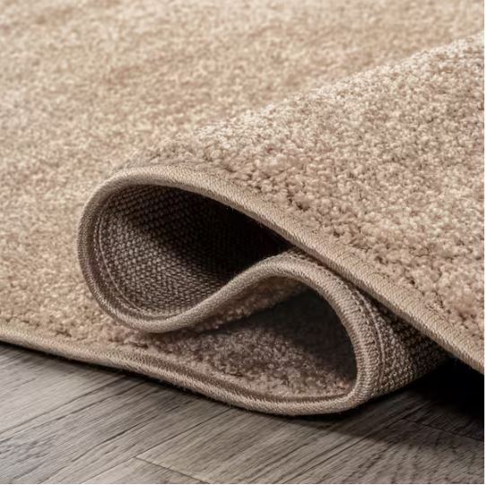 Haze Solid Low-Pile Beige 4 ft. Round Area Rug
