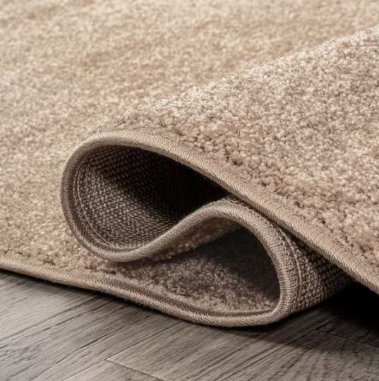 Haze Solid Low-Pile Beige 4 ft. Round Area Rug